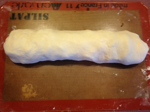 Finish rolling seam side down. Tuck ends in and bake.